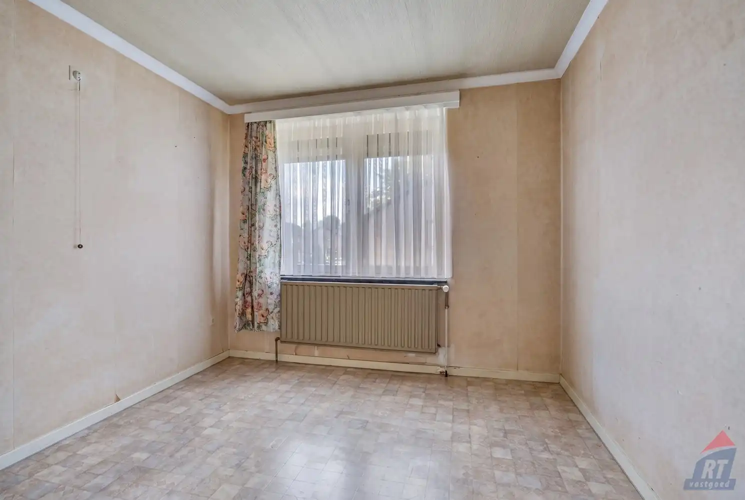 Rustig gelegen, op te frissen woning in Alken foto 18