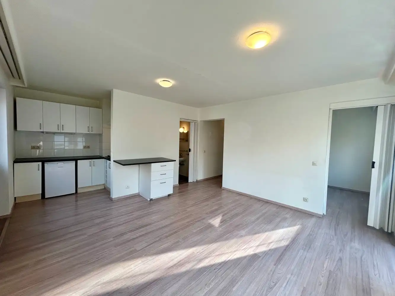 Gelijkvloerse flat met autostaanplaats op topligging binnen de Leuvense ring foto 4