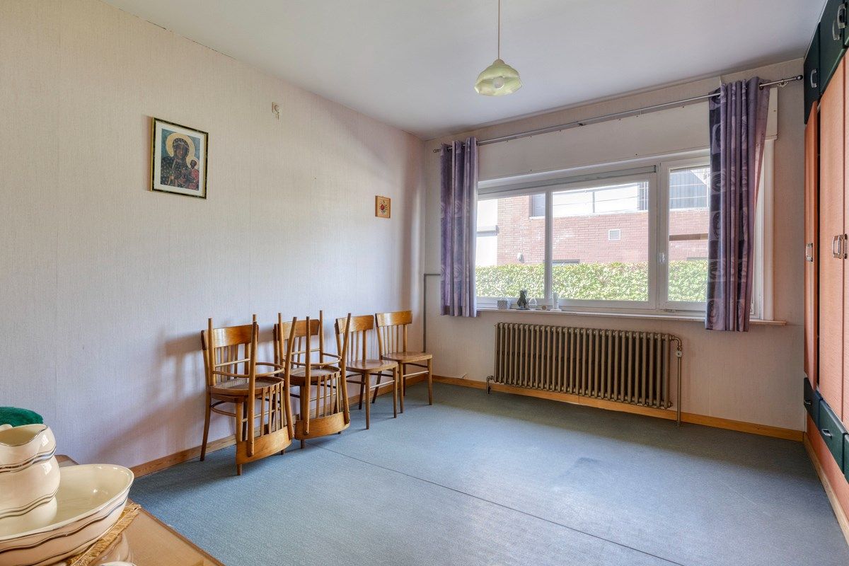 Gelijkvloerswoning met oa 3 slaapkamers in een rustige doodlopende straat. foto 14