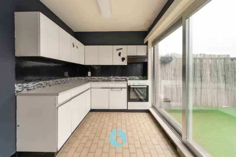 Ruim appartement met 2 slpks, groot terras en garage foto 3