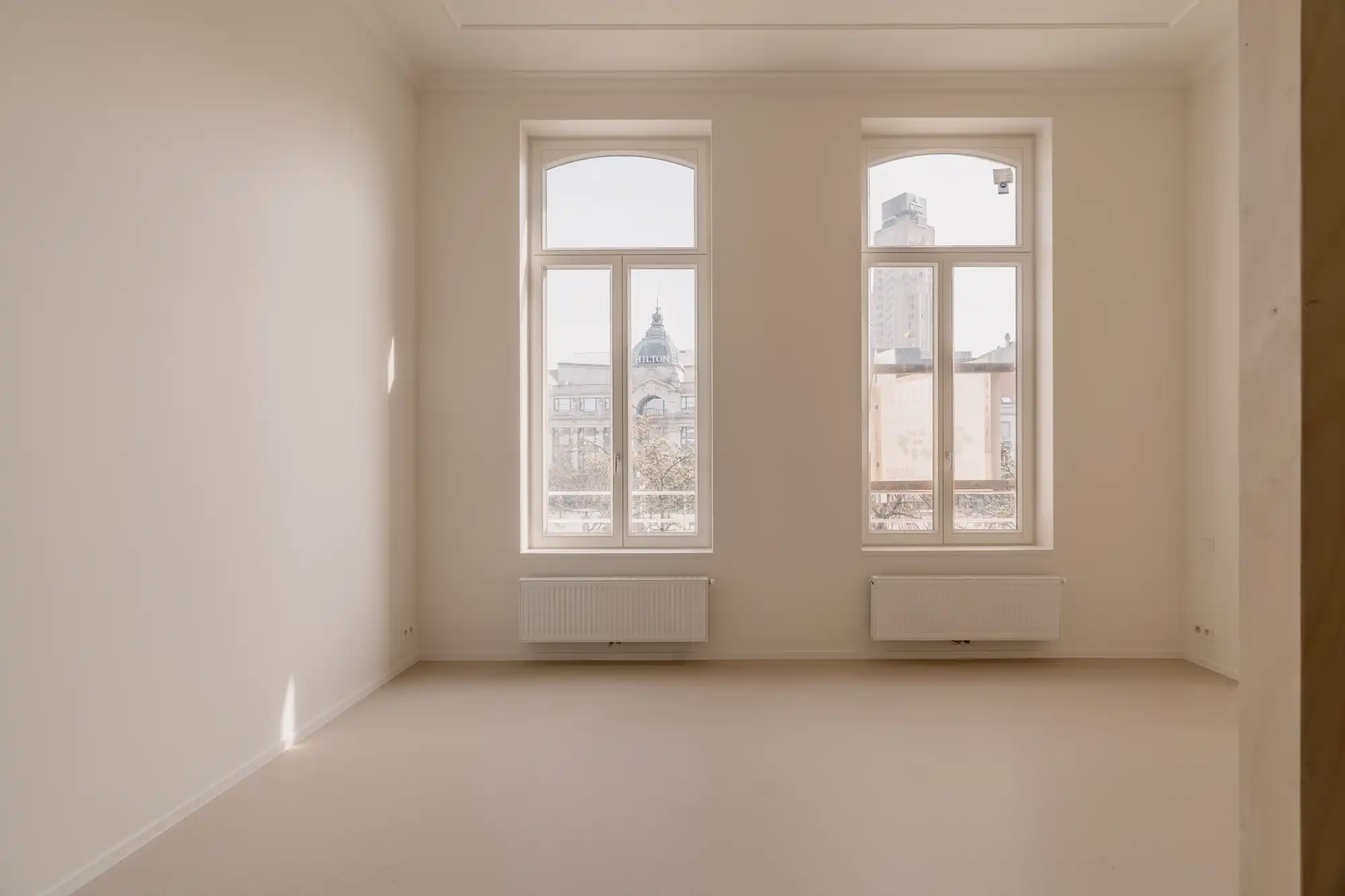 Volledig gerenoveerd duplex appartement met uitzicht op de monumentale gevel van Hilton foto 4