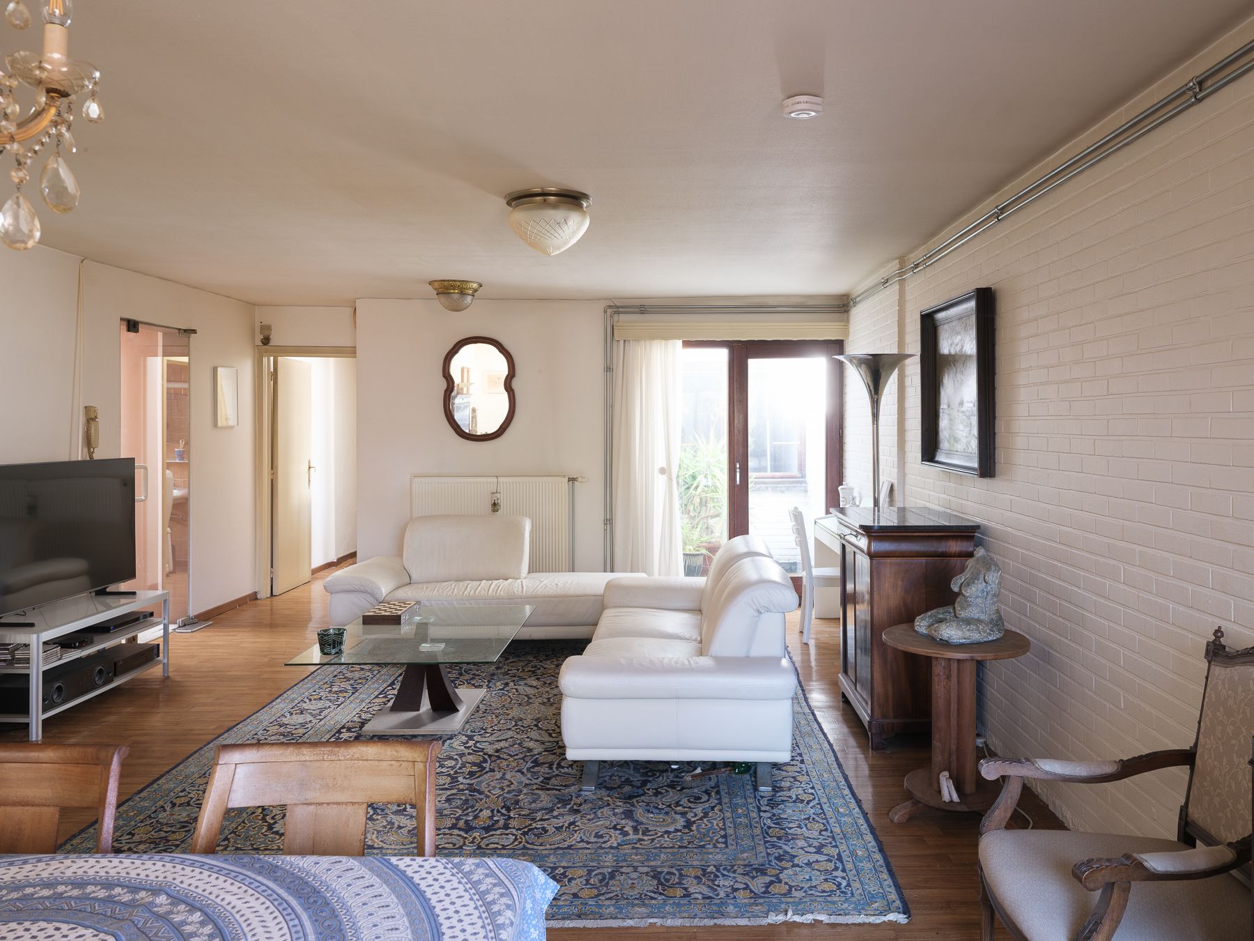 Lichtrijk duplex-appartement met potentieel foto 4