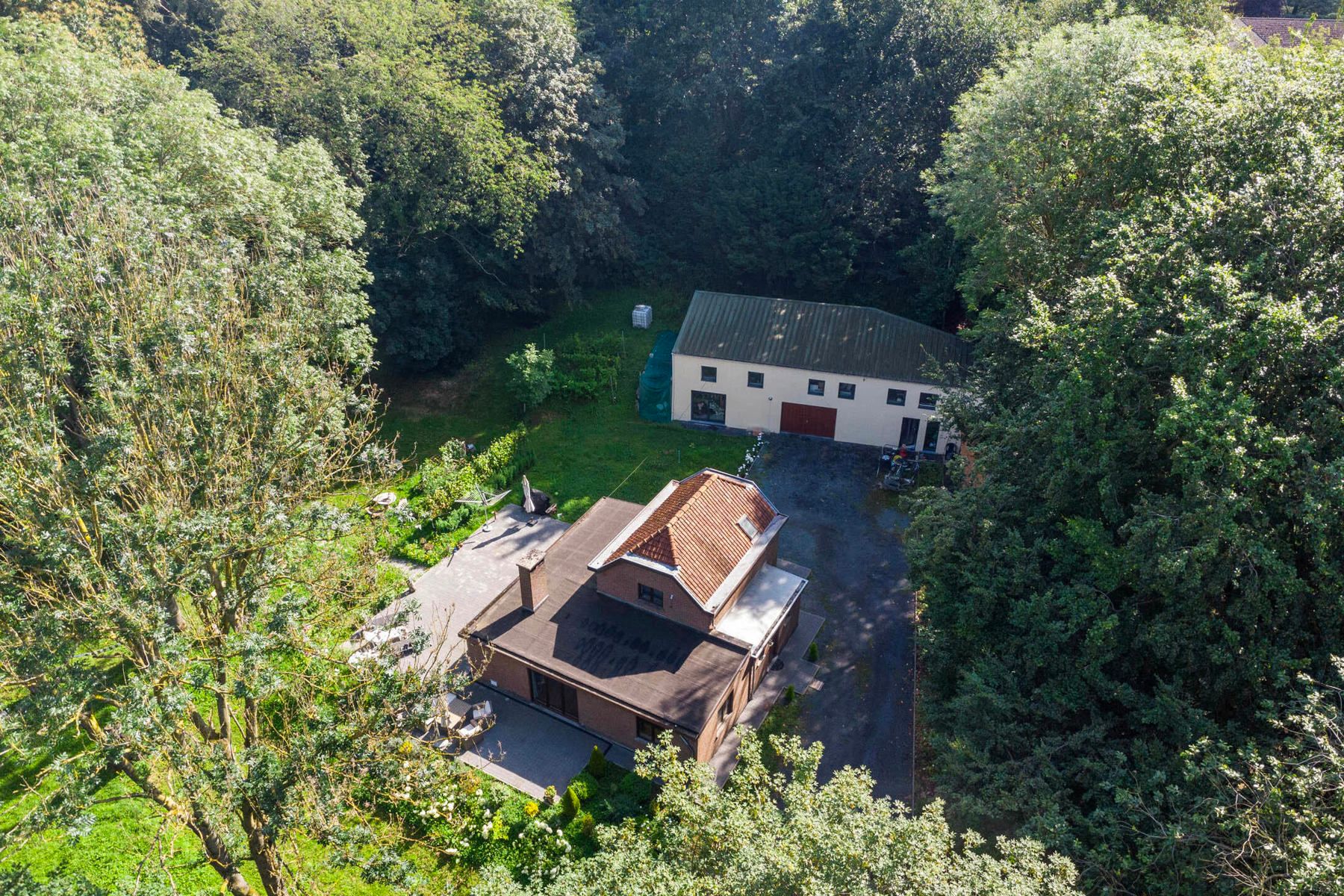 Unieke woning te midden van het prachtige Kamerijkbos foto 27