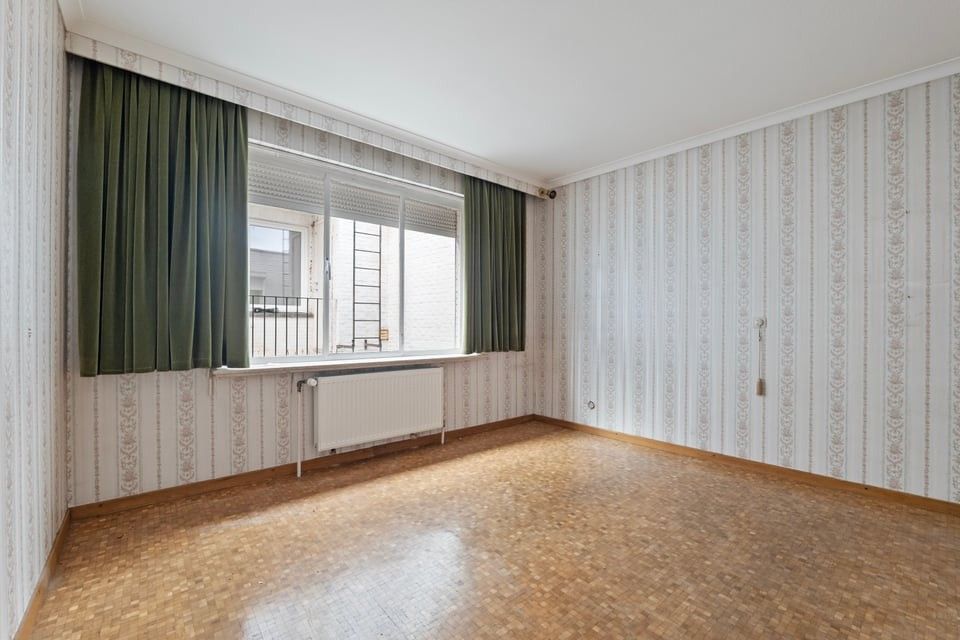 TE RENOVEREN APPARTEMENT MET 2 SLKS IN HET CENTRUM VAN SINT-TRUIDEN foto 12