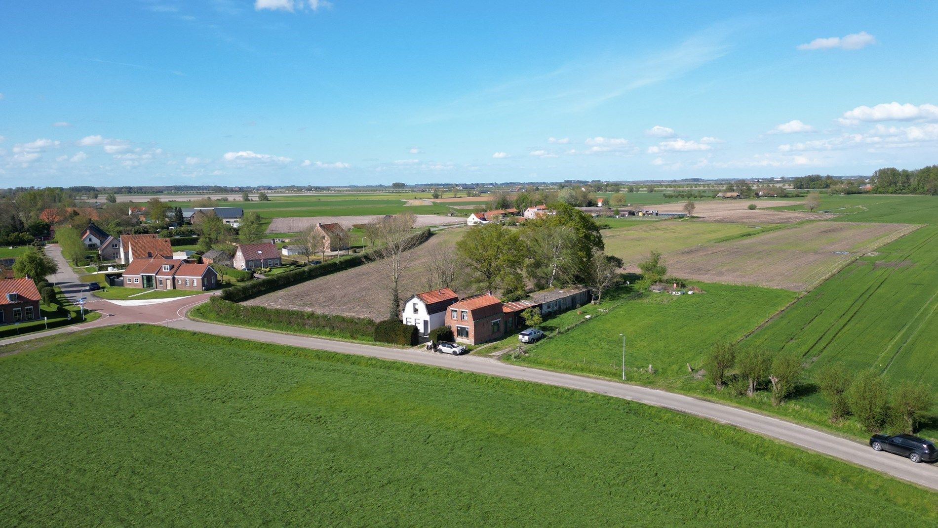 Bouwgrond met een oninneembaar uitzicht van meer dan 2.2 ha over de velden en natuur! foto 3