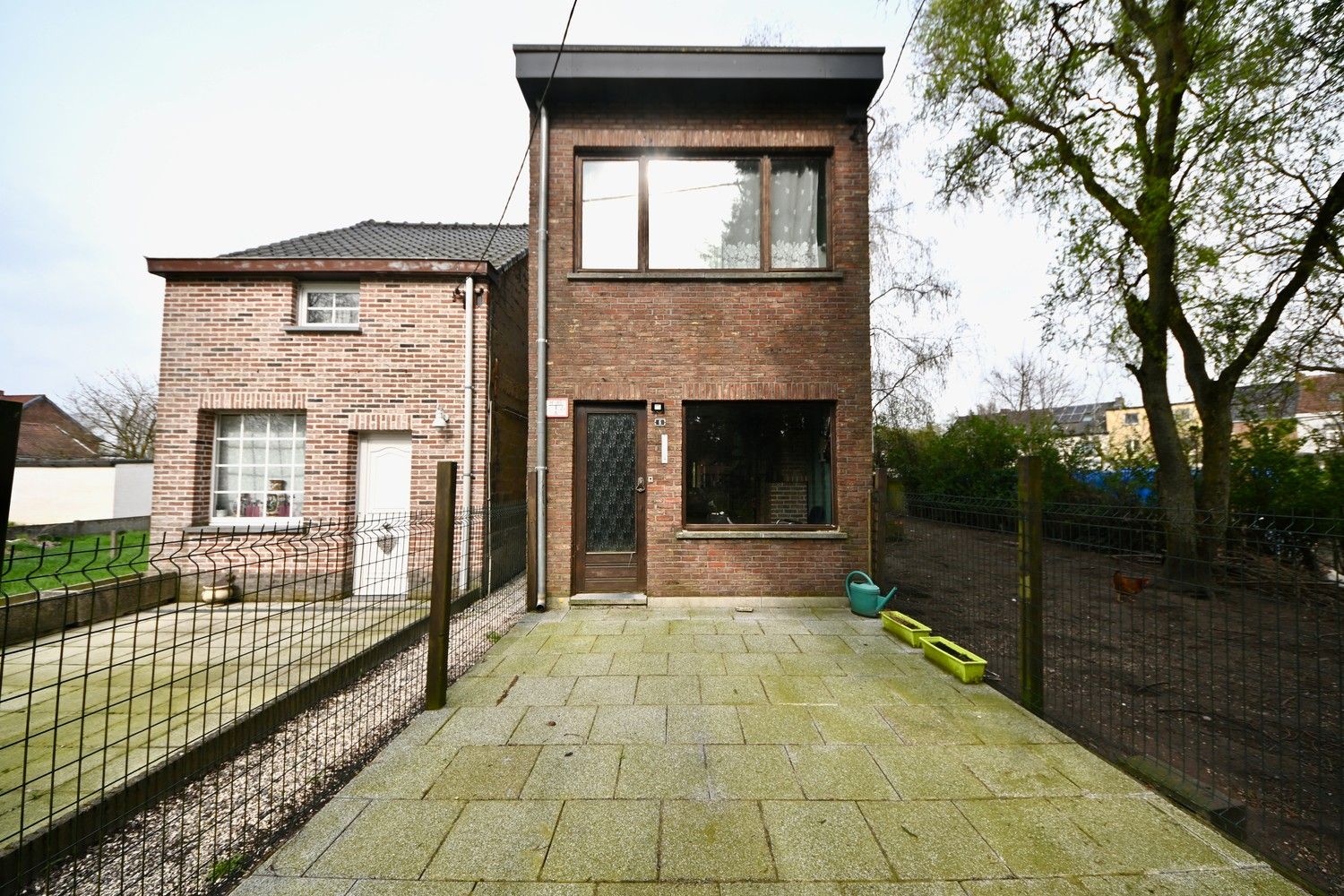 Hoofdfoto van de publicatie: Te renoveren woning met 2 slaapkamers en tuin.