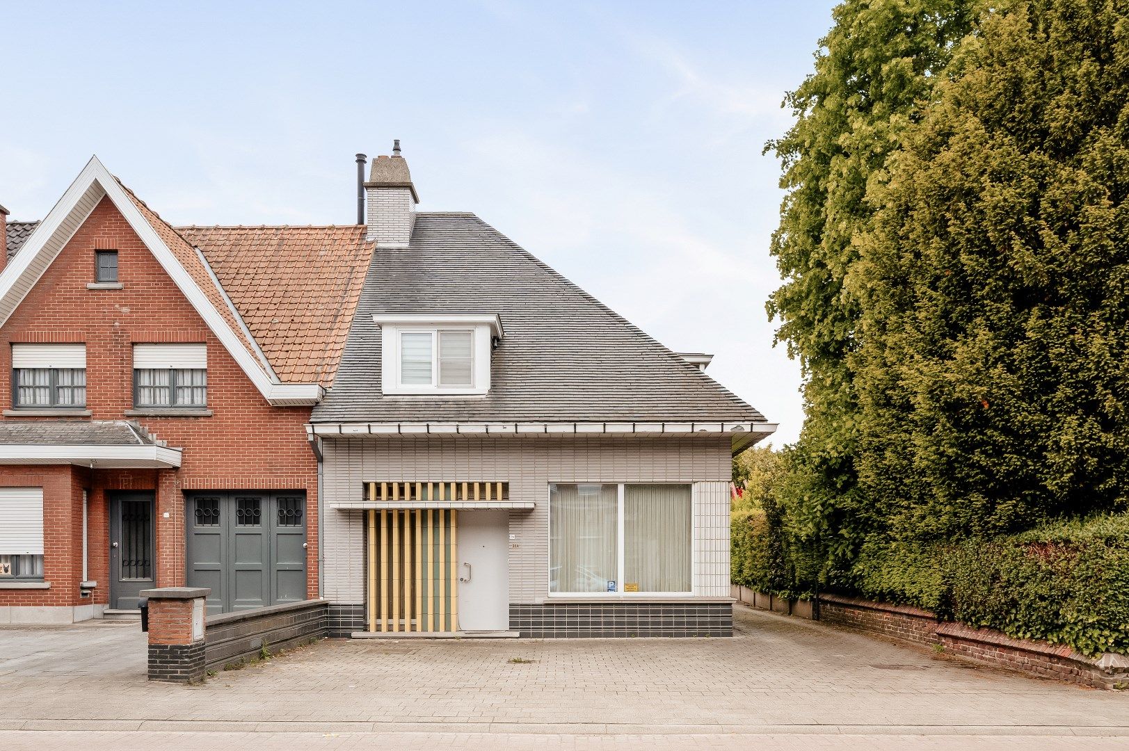 Halfopen woning met tuin, garage en loods 140m² foto 2