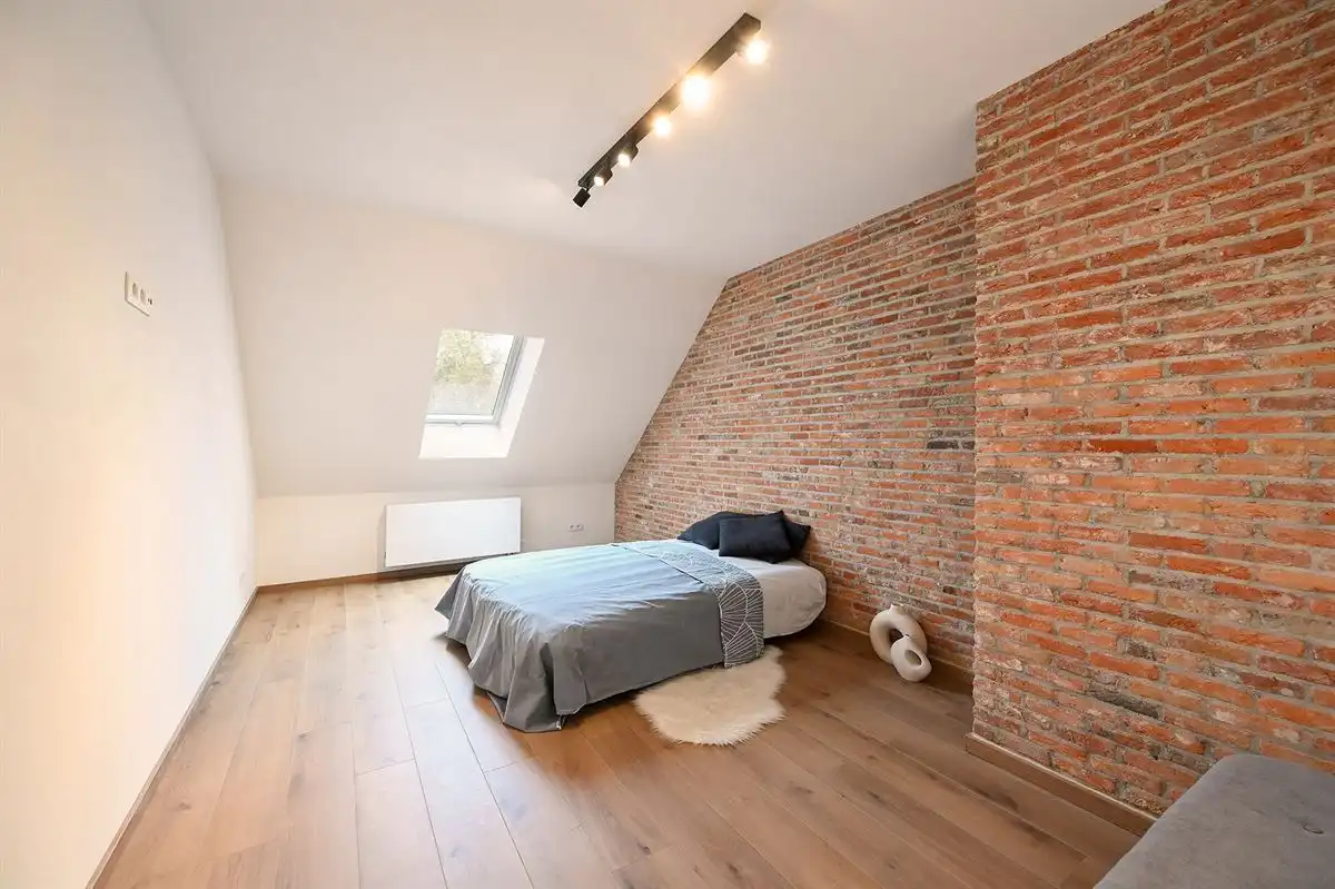 Uniek dakkappartement met zeer grote garage foto 12