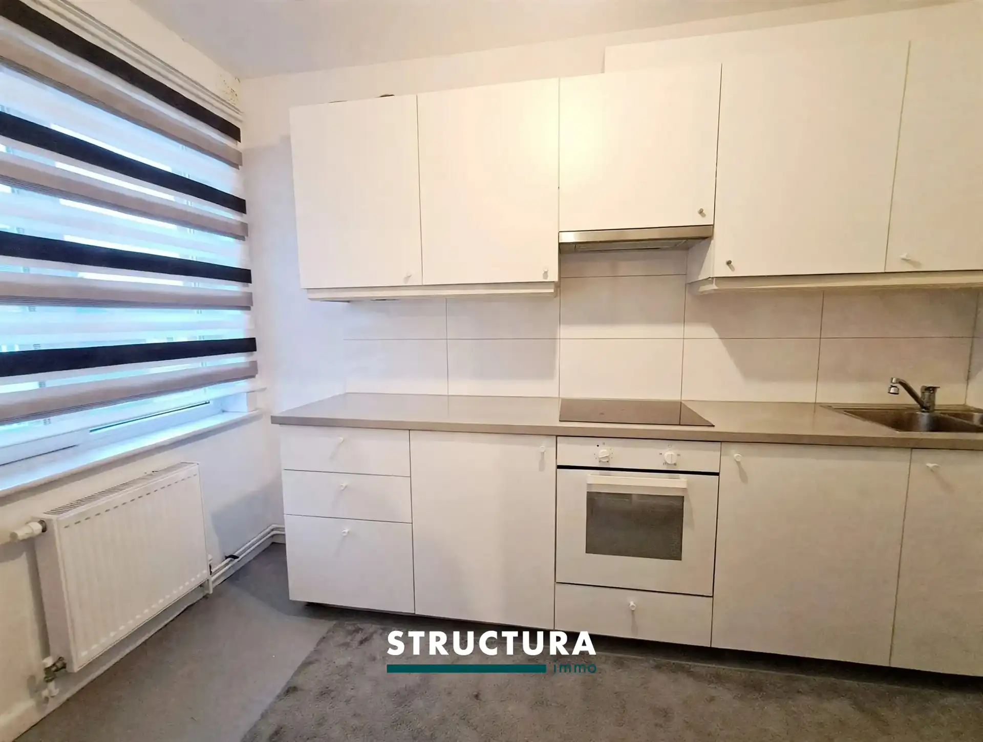 Gerenoveerd appartement in centrum Strombeek-Bever foto 3