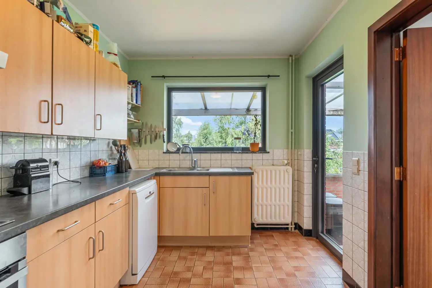 Gerenoveerde en energiezuinige woning met 3 slaapkamers, een diepe tuin en een garage met een oprit op een toplocatie te Kessel-Lo! foto 18