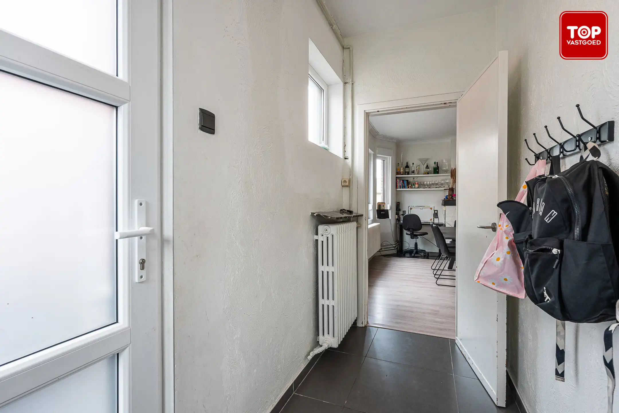 Instapklare halfopen woning in een gezinsvriendelijke buurt. foto 2