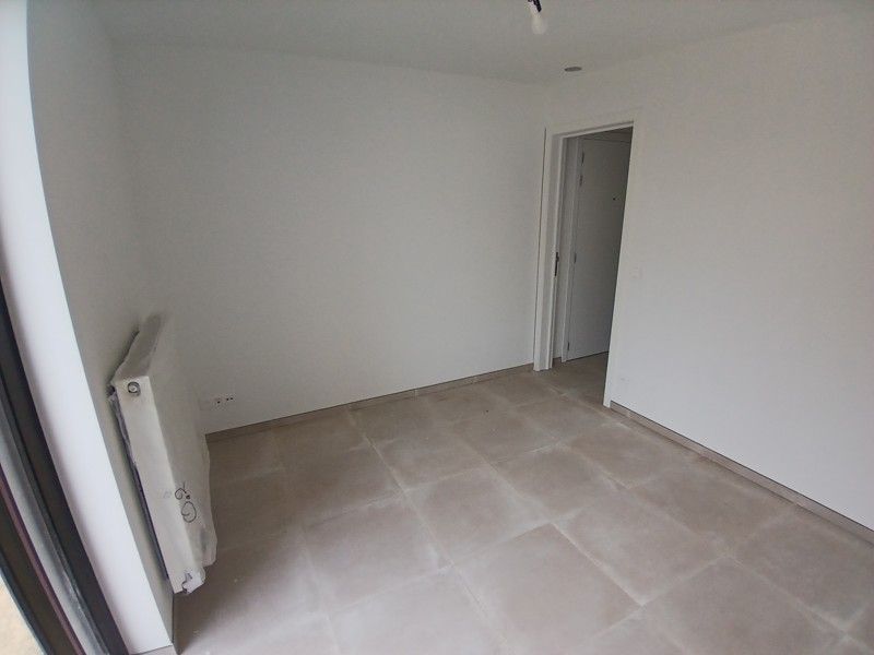 Gelijkvloers nieuwbouw appartement met terras en tuin gelegen in het centrum van Opglabbeek foto 15
