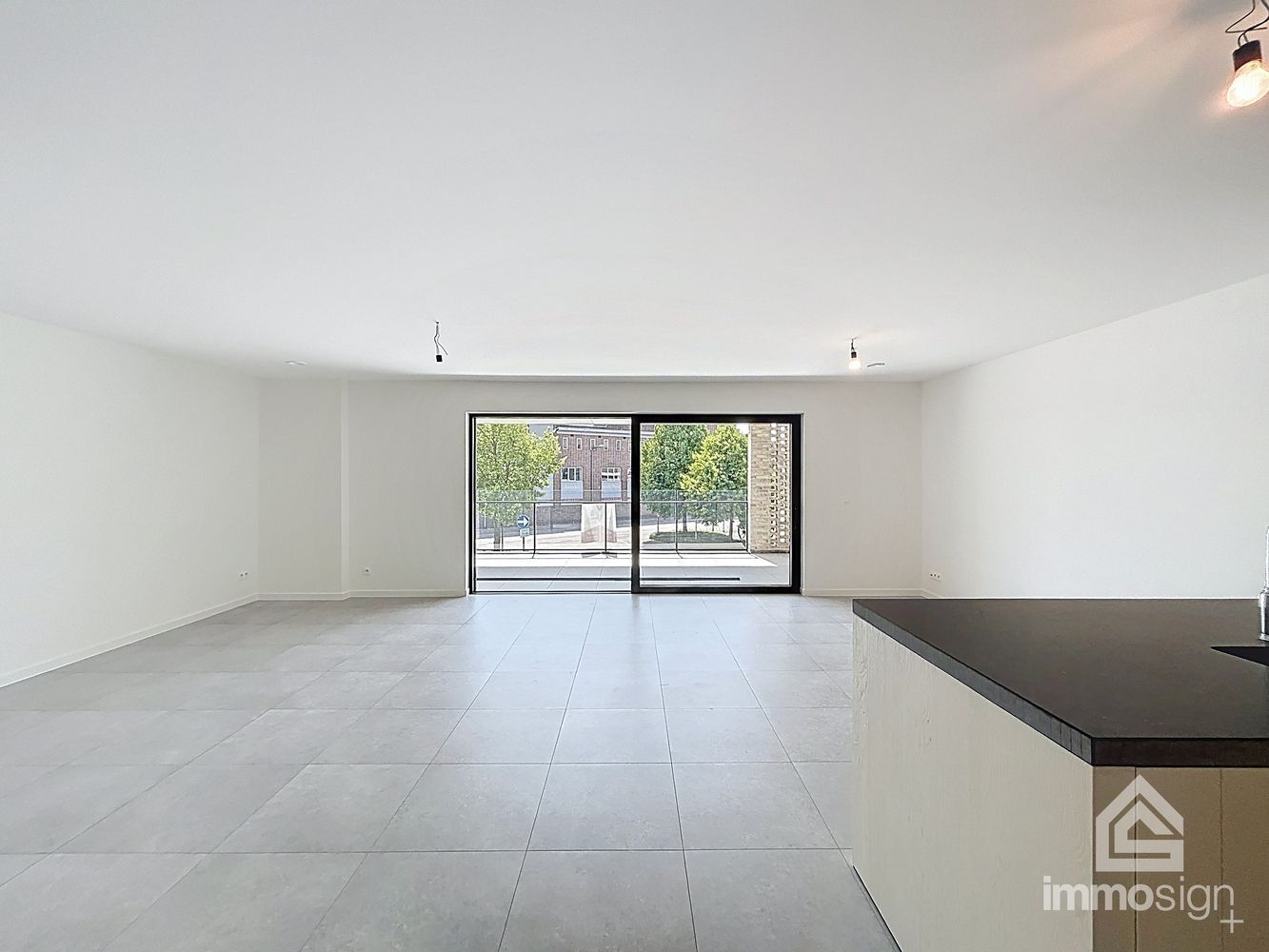 Instapklaar nieuwbouwappartement met 2 slaapkamers, terras en autostaanplaats te Kinrooi foto 7