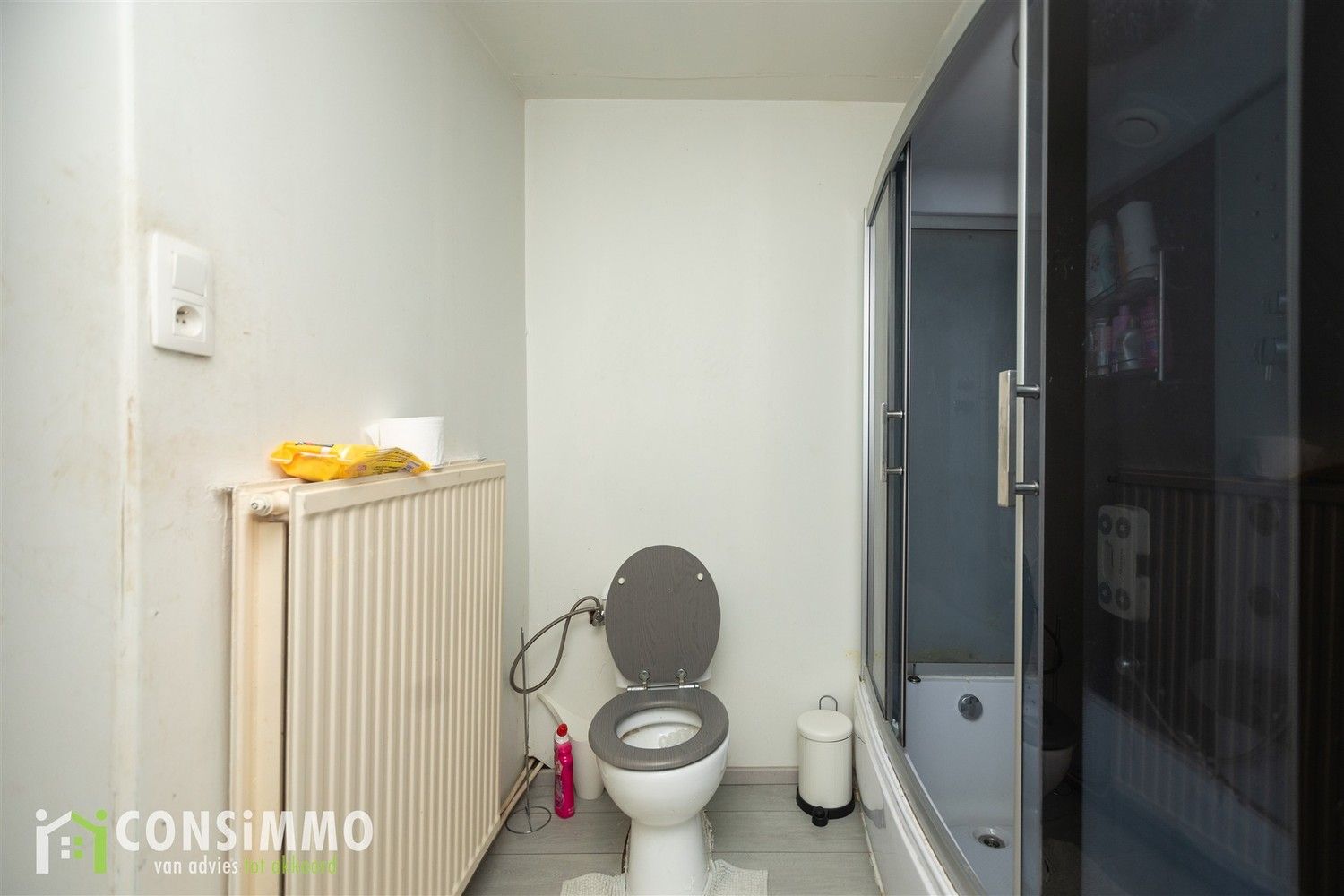 Gelijkvloerse woning met veel potentieel - vergunde nieuwbouwmogelijkheid in Genk foto 11