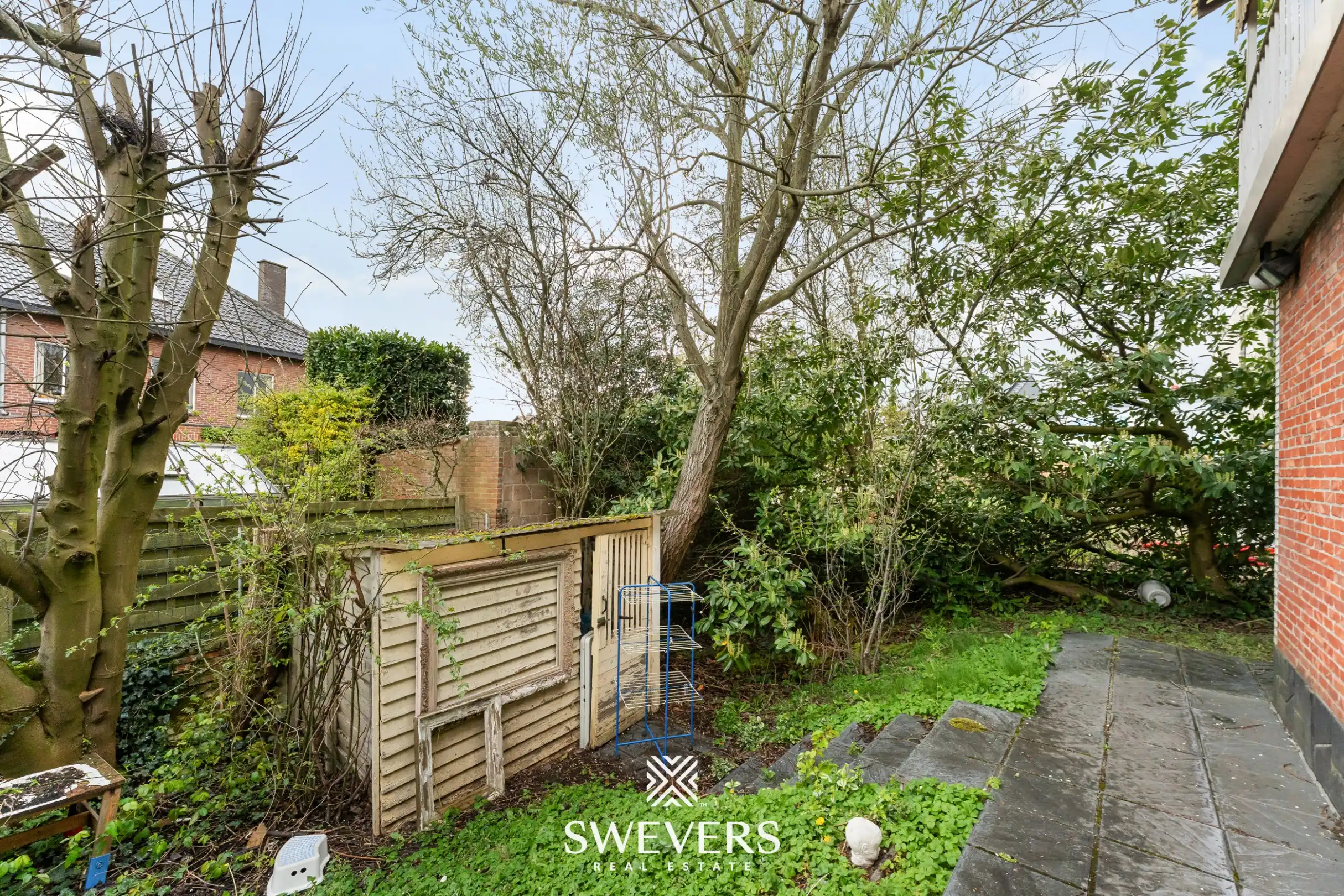 Ruime halfopen bebouwing met 4 slaapkamers en veel renovatiepotentieel op topligging in Hasselt foto 26