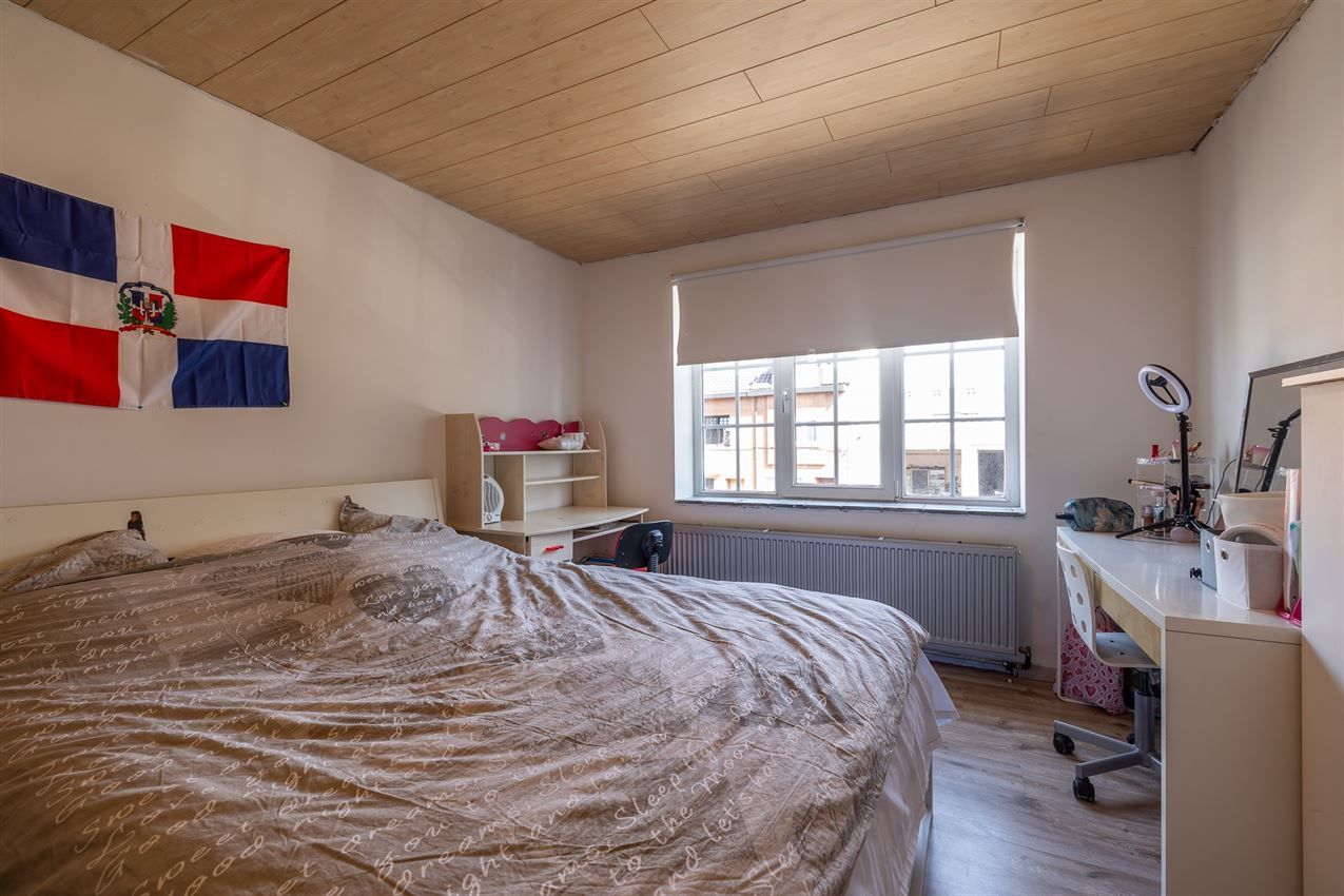 Stadswoning met 3 slpk., tuin en garage foto 21