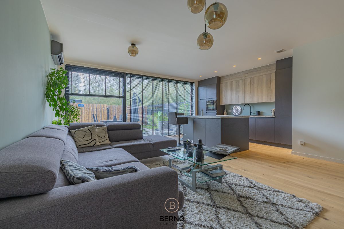 Recent gelijkvloers appartement met zonnig terras en tuintje in Opstal foto 4