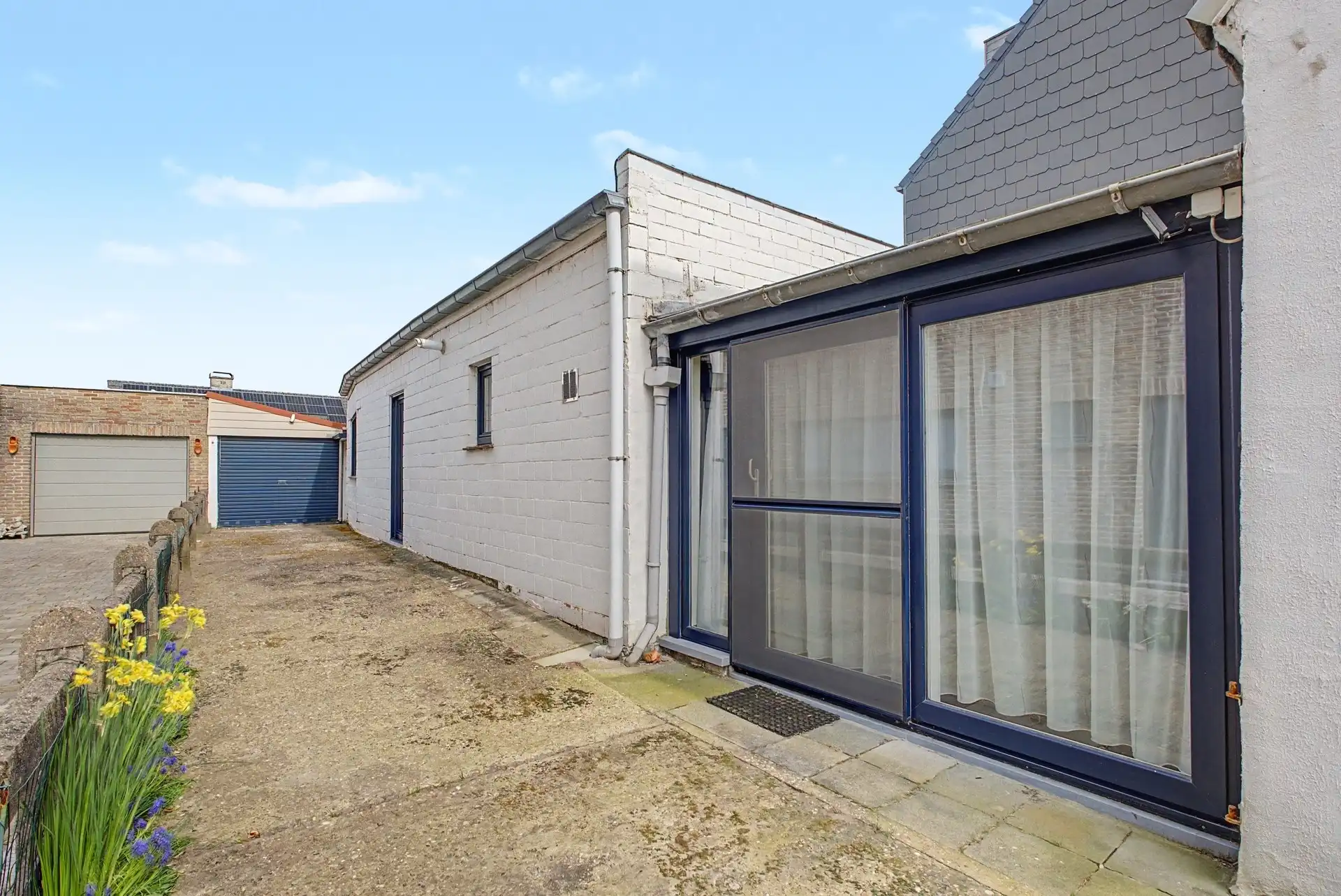 Instapklare halfopen bebouwing met 2 slaapkamers en garage nabij centrum Uitbergen foto 17