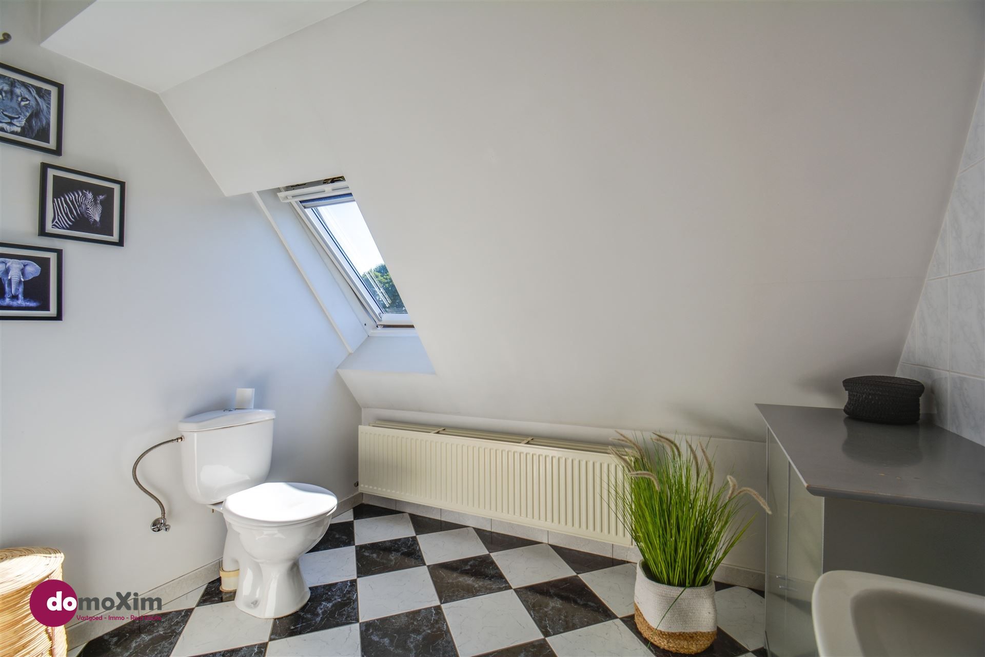 Gezellige rijwoning met 2 slaapkamers en garage in centrum Rijmenam foto 16