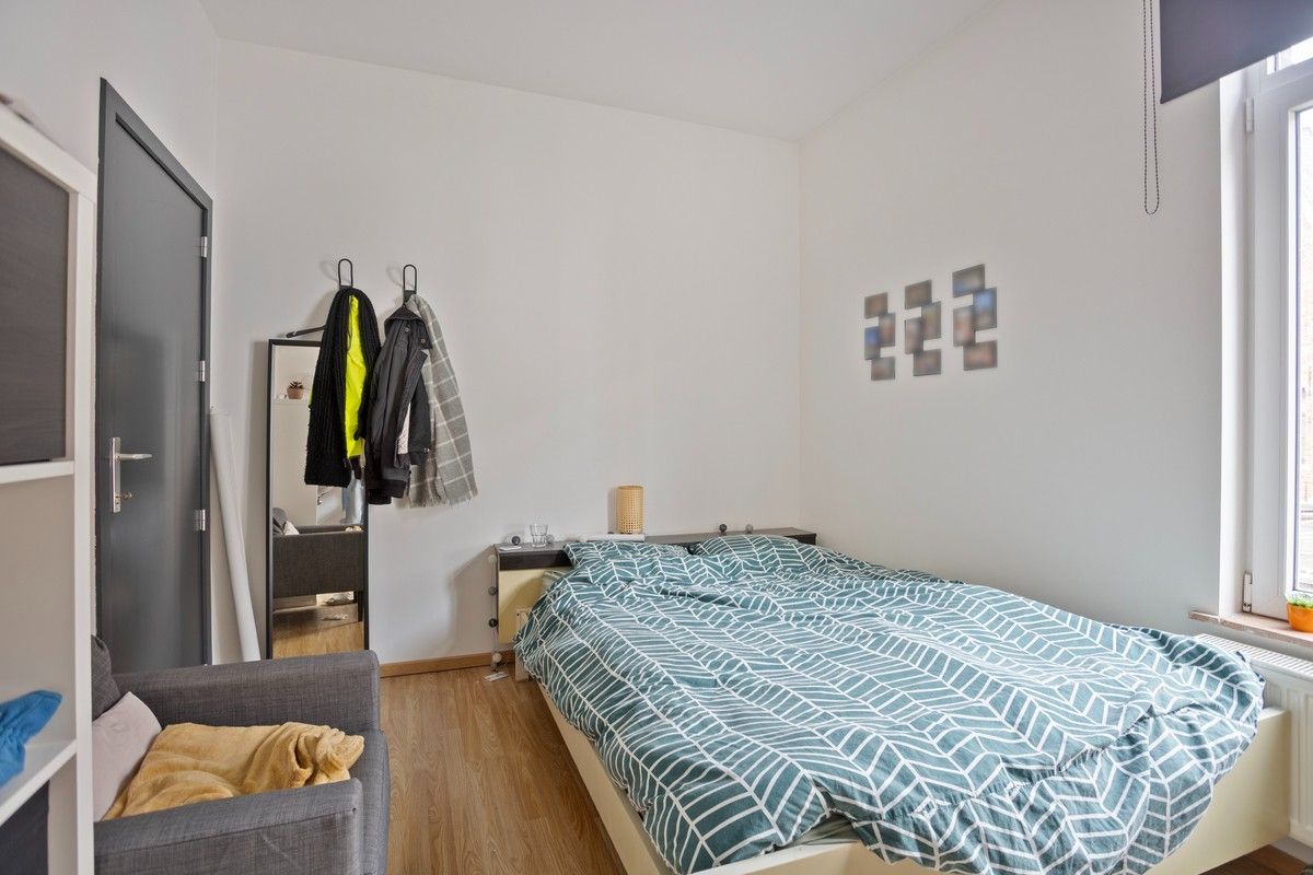 Opbrengsteigendom met 5 studentenkamers op toplocatie in hartje Leuven foto 13