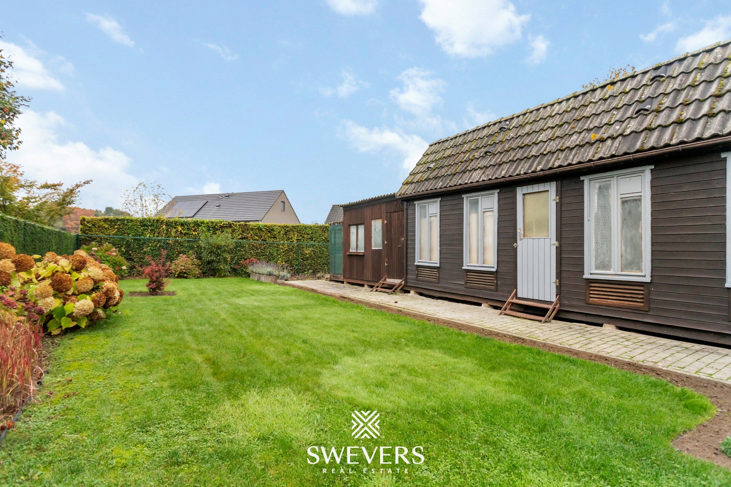 Gezellige gezinswoning met overdekt terras en zuidwestgerichte tuin te Hoepertingen foto 24