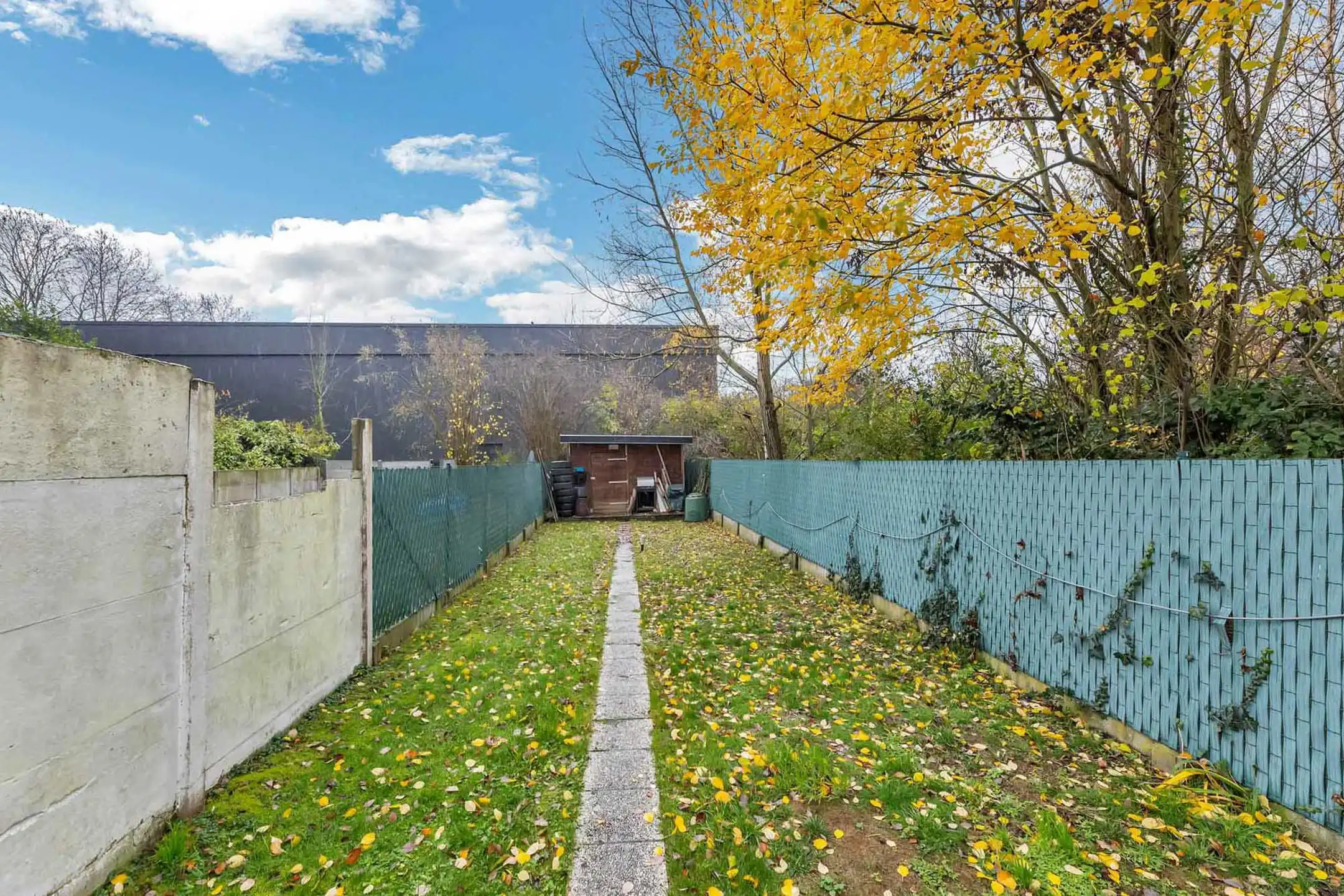 Gesloten bebouwing met 4 slaapkamers en tuin foto 16