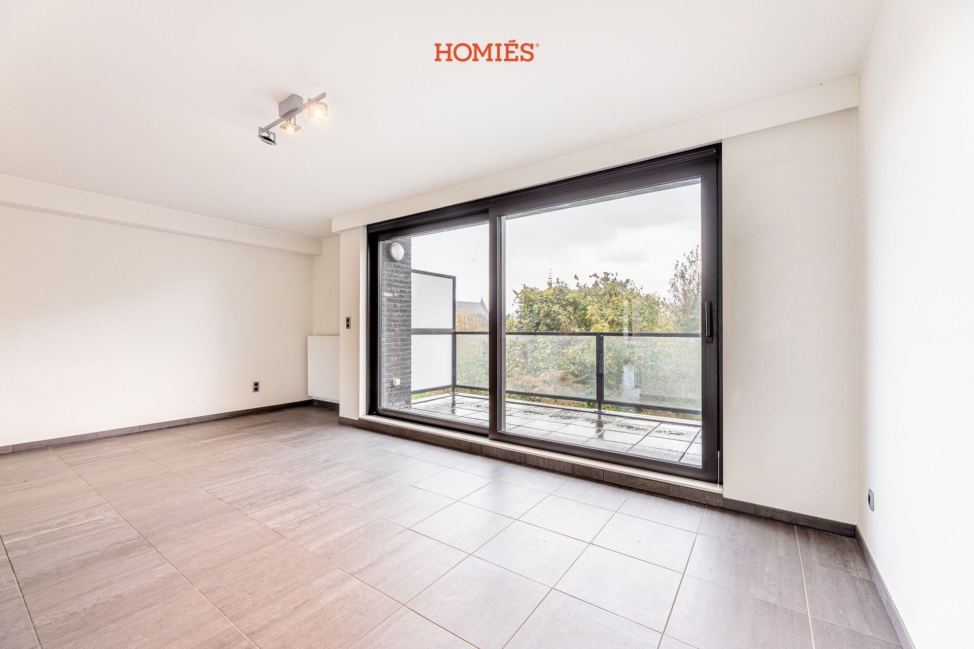 Ruim triplex appartement op strategische locatie foto 3