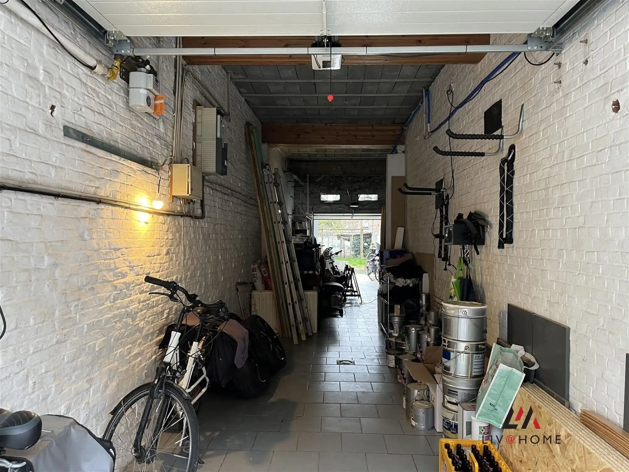 2 aangrenzende rijwoningen met gemeenschappelijke tuin foto 21