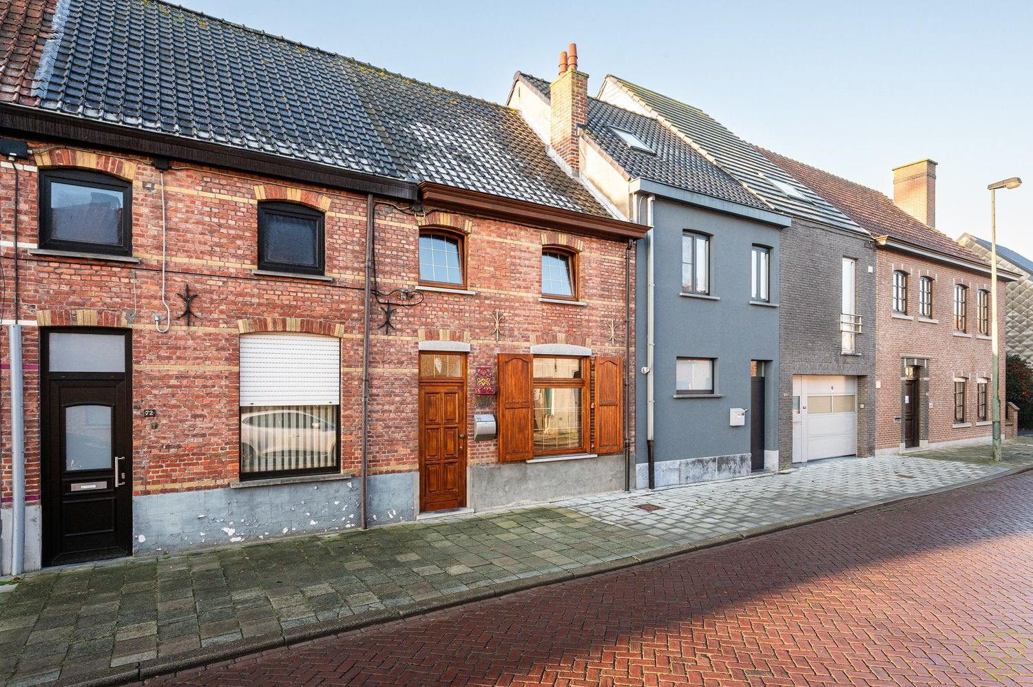 Charmante gesloten bebouwing met ruime tuin en renovatiepotentieel foto 25