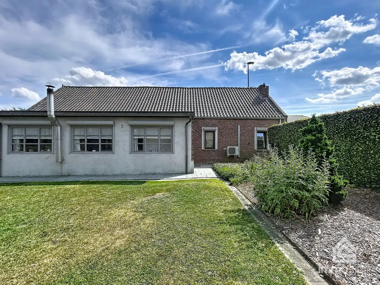 Ruime woning op bijna 2.000 m² grond met dubbele garage en werkhuis foto 46