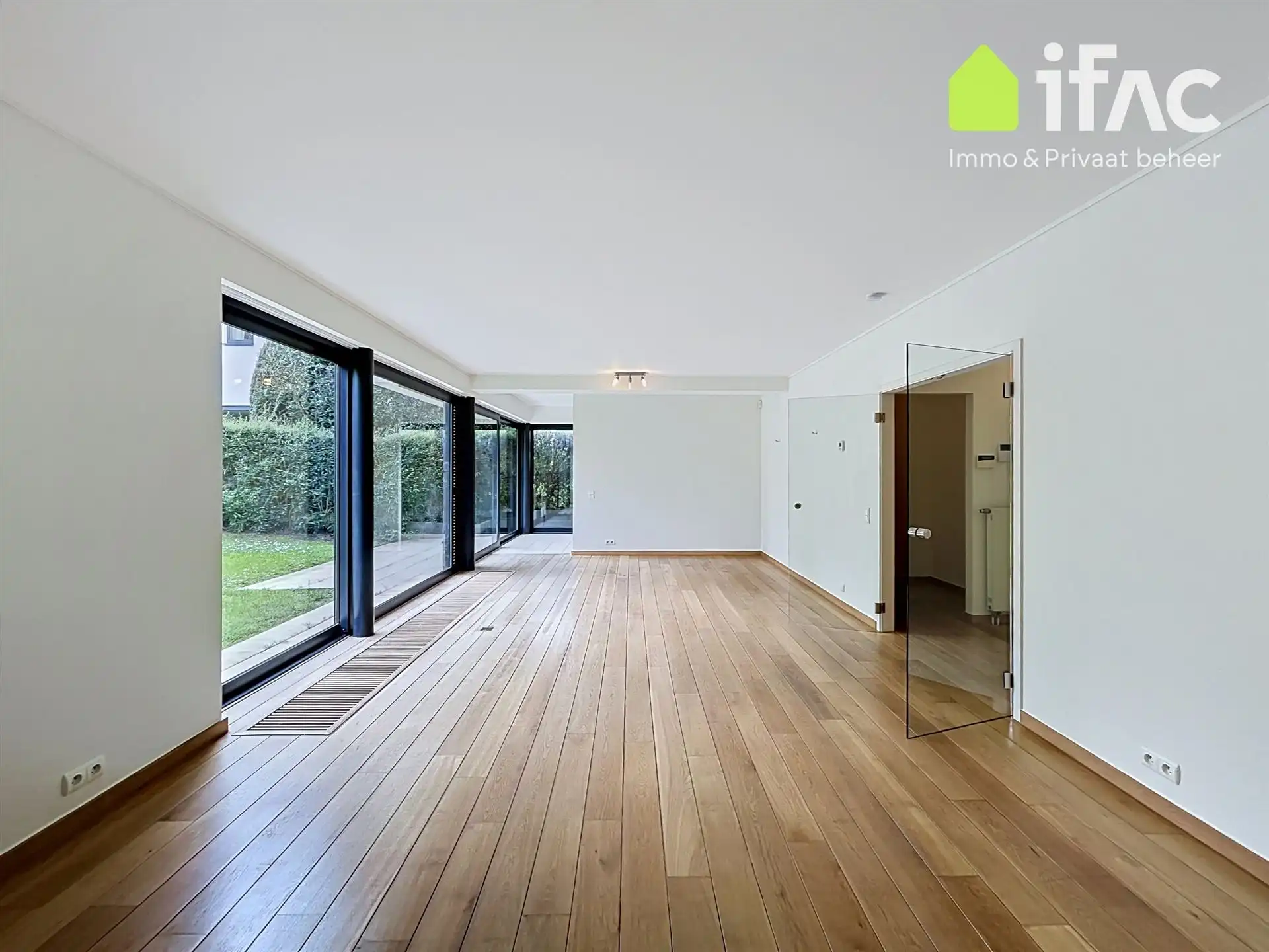 Exclusief gelijkvloers appartement met 2sk en privé tuin foto 3