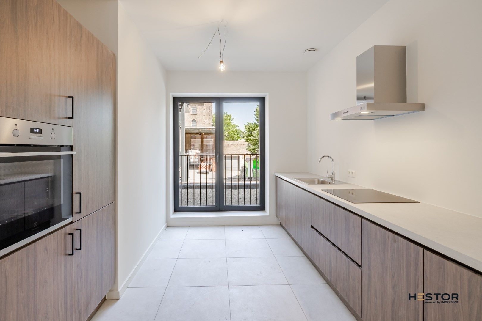 Afgewerkt nieuwbouwappartement met 2 slaapkamers foto {{pictureIndex}}