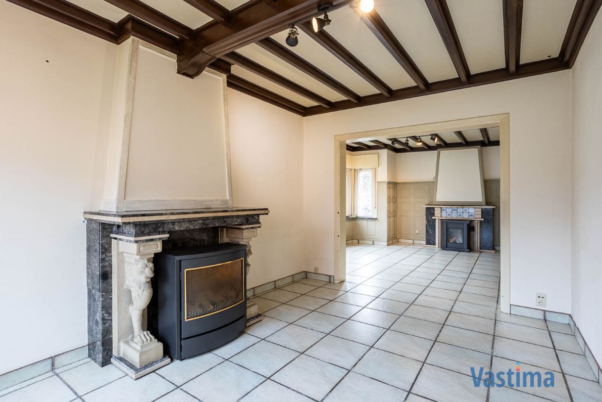 Te renoveren, halfopen woning met zuid gerichte tuin foto 4