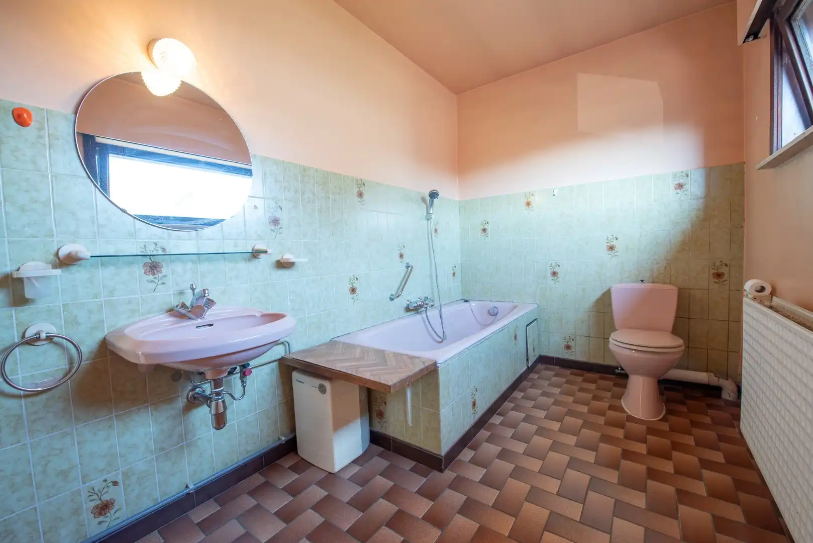 Praktische woning met 3 slaapkamers, garage, veranda en leuke tuin in centrum Wontergem foto 10