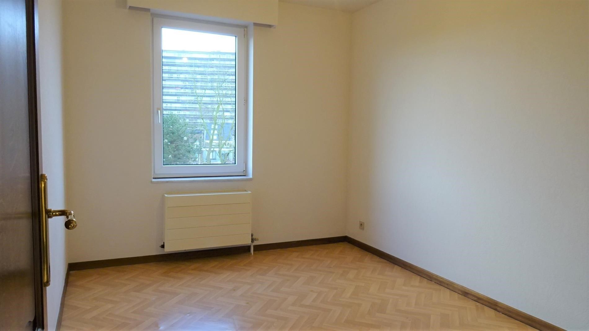 Ruim app. met 2 slpks, terras, optionele garage en kelder foto 8
