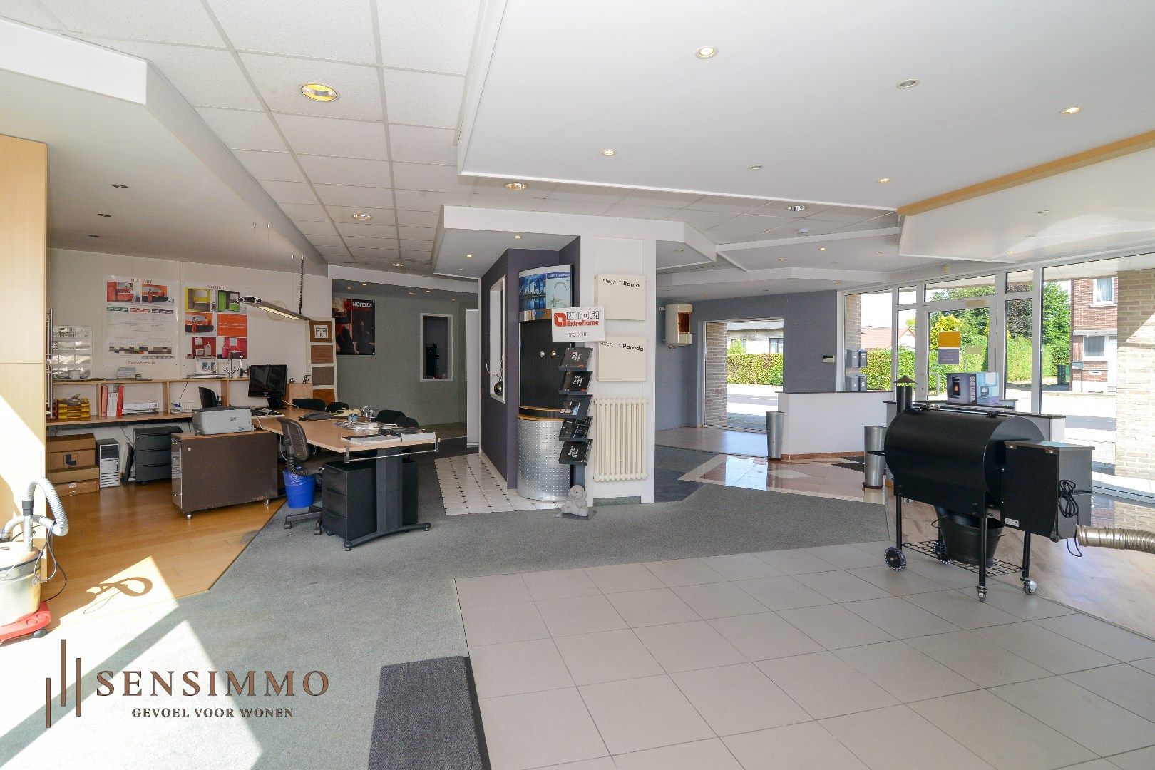 INVESTEERDERSOPPORTUNITEIT - GEBOUW MET TOONZAAL + 4 APPARTEMENTEN + MAGAZIJN + GARAGEBOXEN + BOUWGROND foto 8