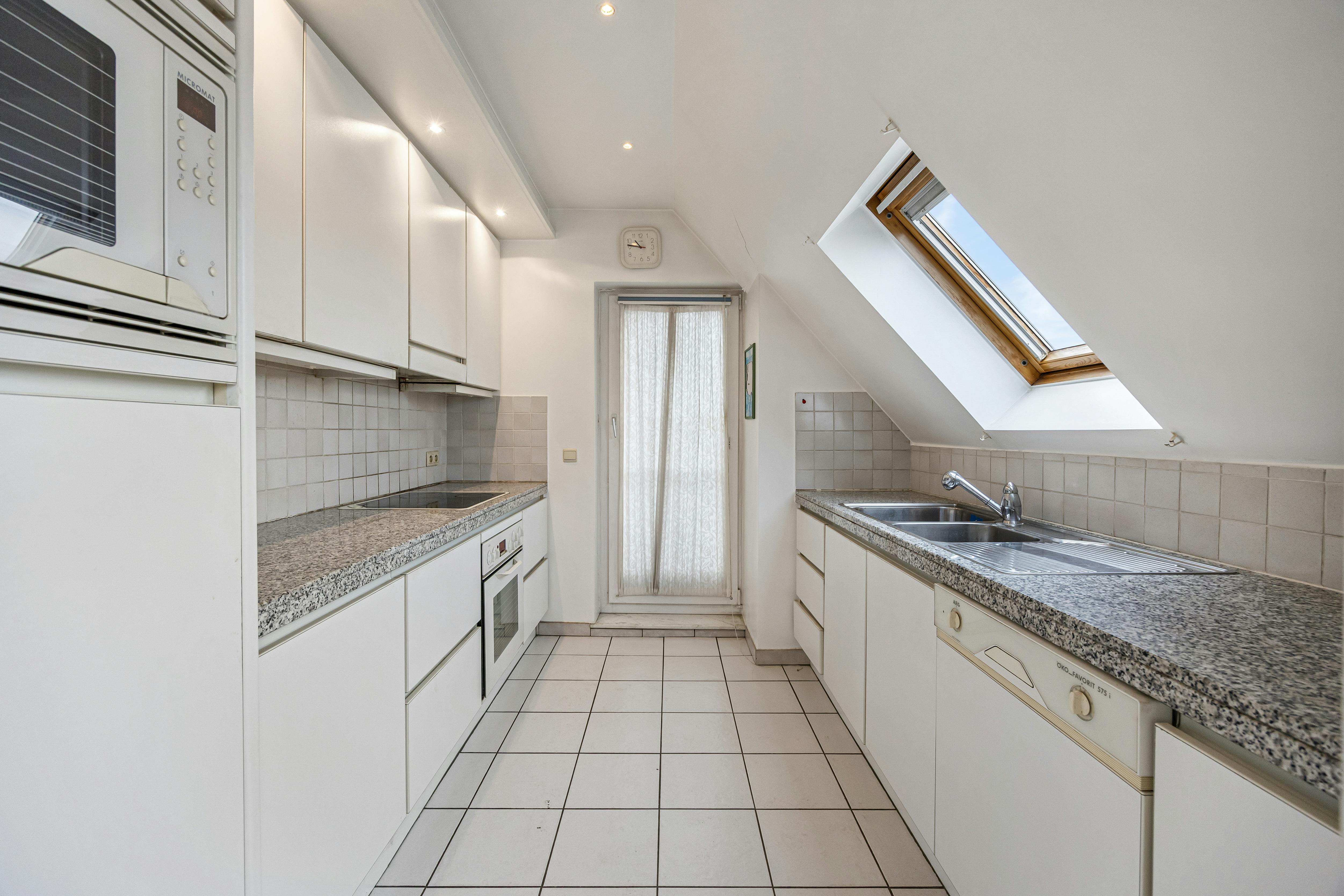 Penthouse in hartje Genk foto 8