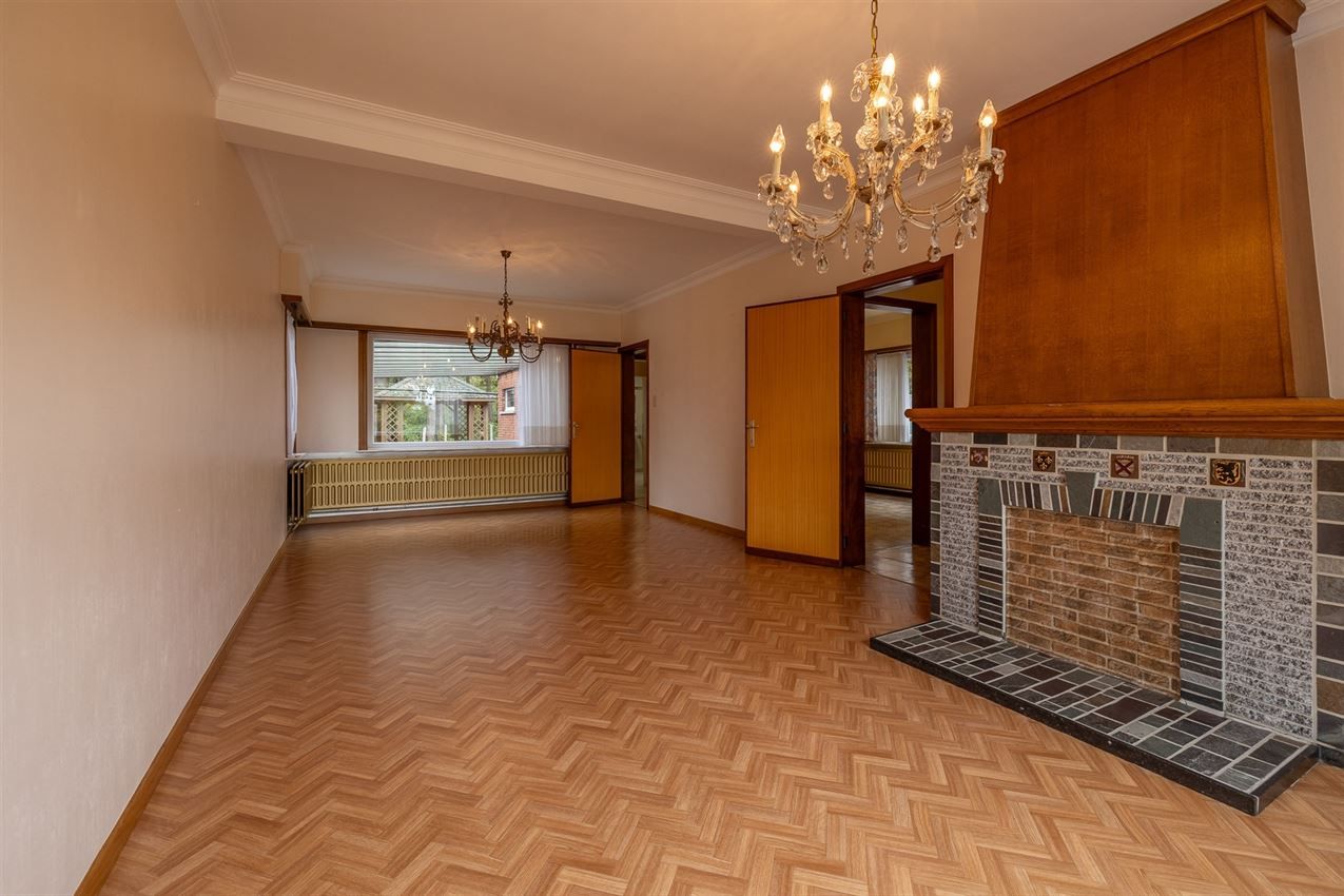 Temidden van agrarisch gebied, grenzend aan bos foto 8