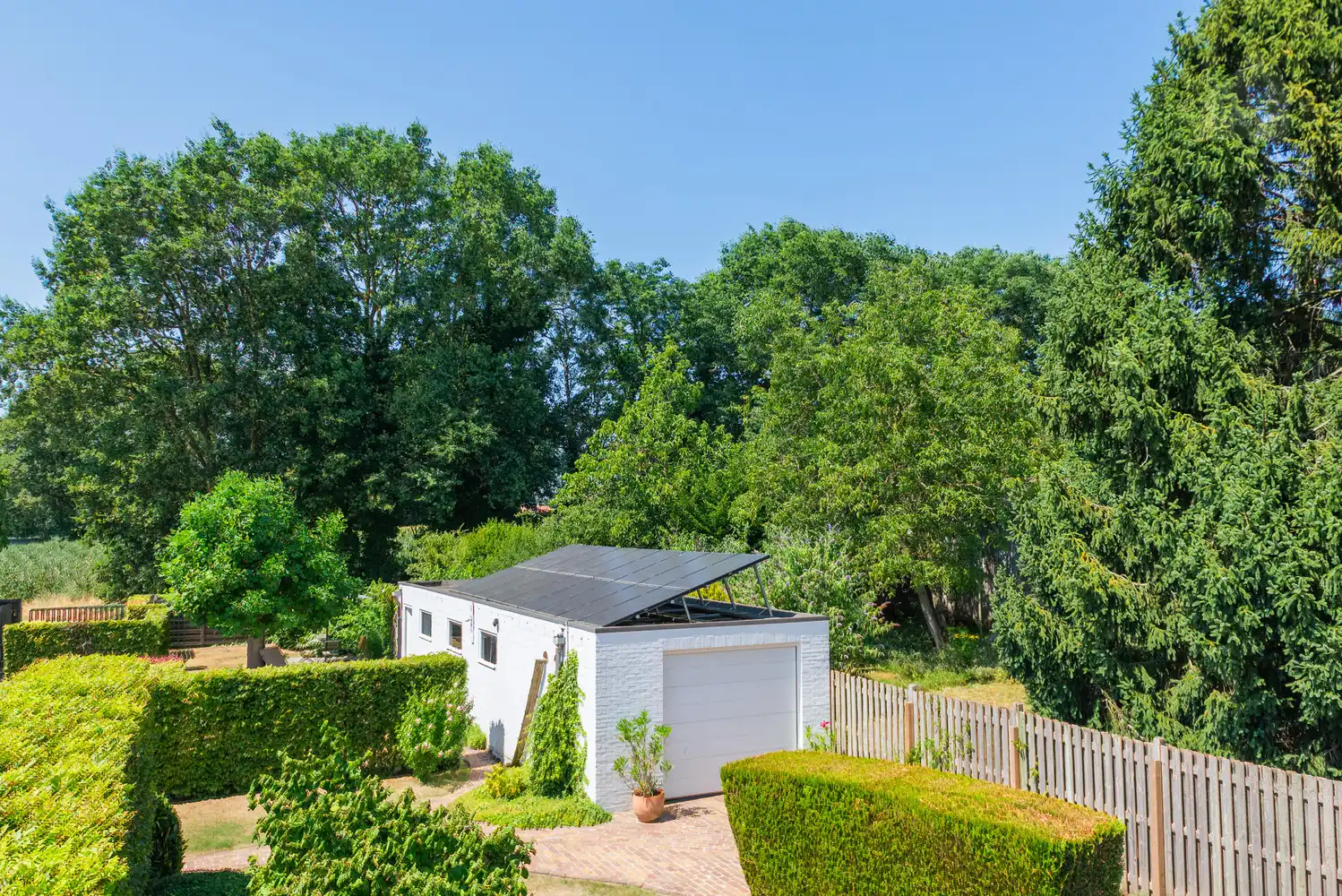 Instapklare gezinswoning met 5 slaapkamers, grote garage en zonnige tuin in Meerhout. foto 26