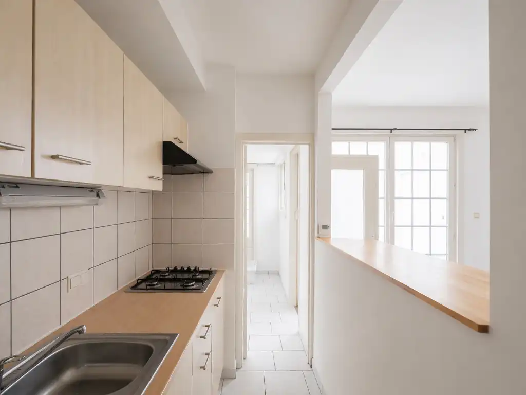 Opbrengsteigendom bestaande uit verschillende studio's en éénslaapkamer­appartementen in het centrum van Gent. foto 4