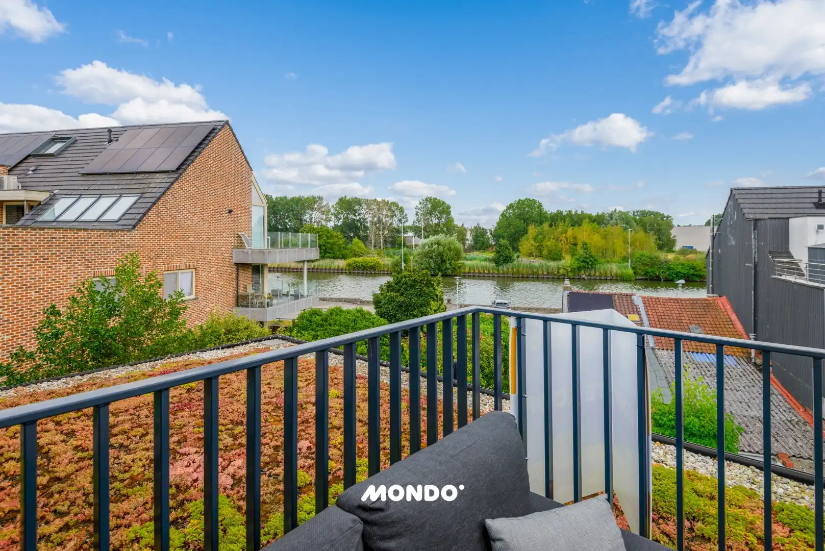 Energiezuinig penthouse met ruim terras, autostaanplaats en zicht op het kanaal foto 21