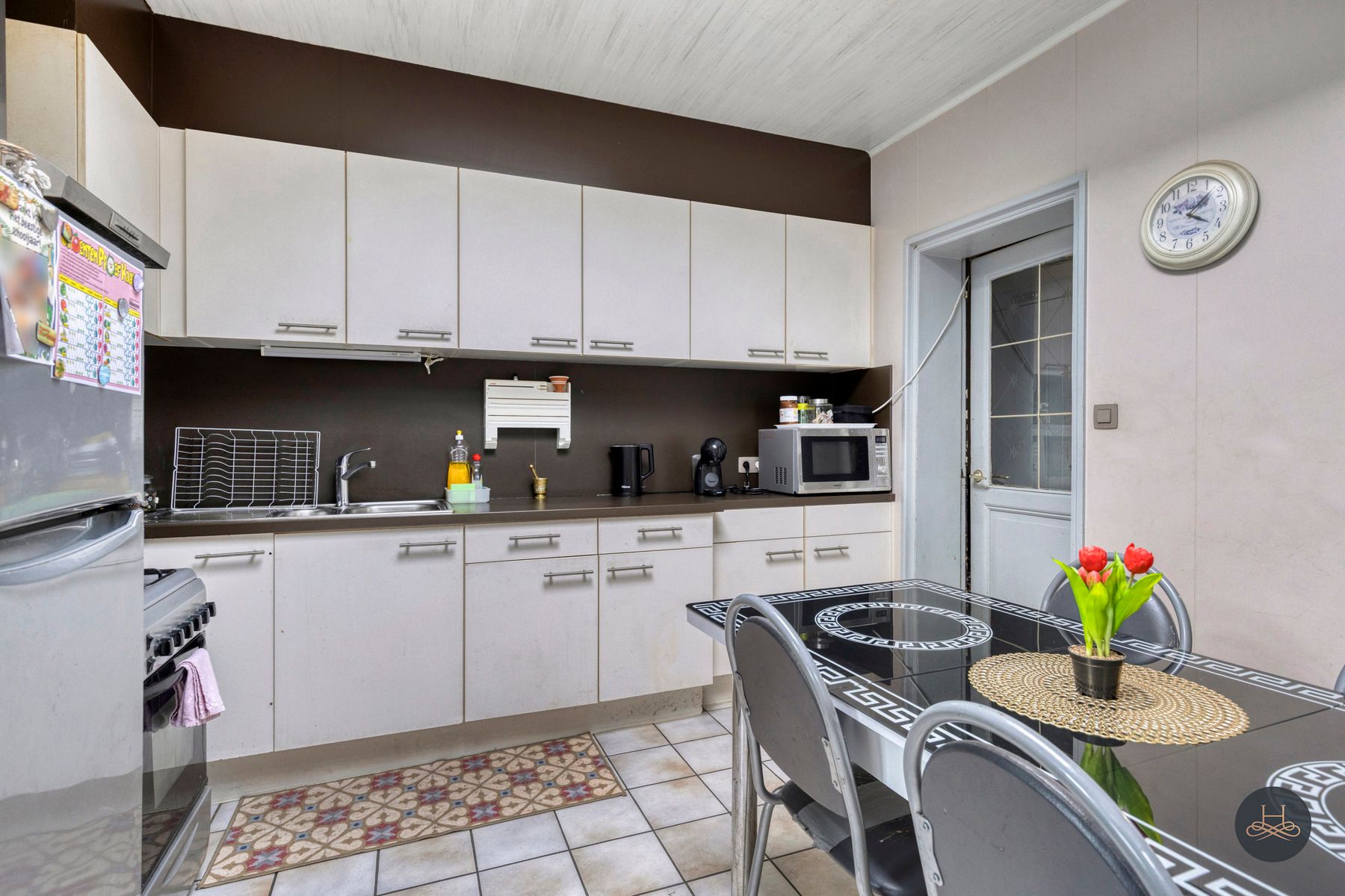 Knappe renovatiewoning met binnenplaats en 4 slaapkamers foto 10