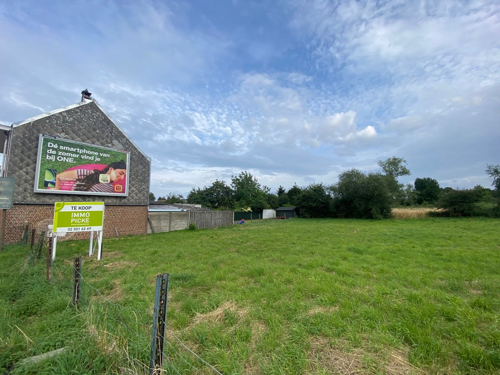 Mooi perceel bouwgrond van 5a 18ca - halfopen bebouwing foto 2