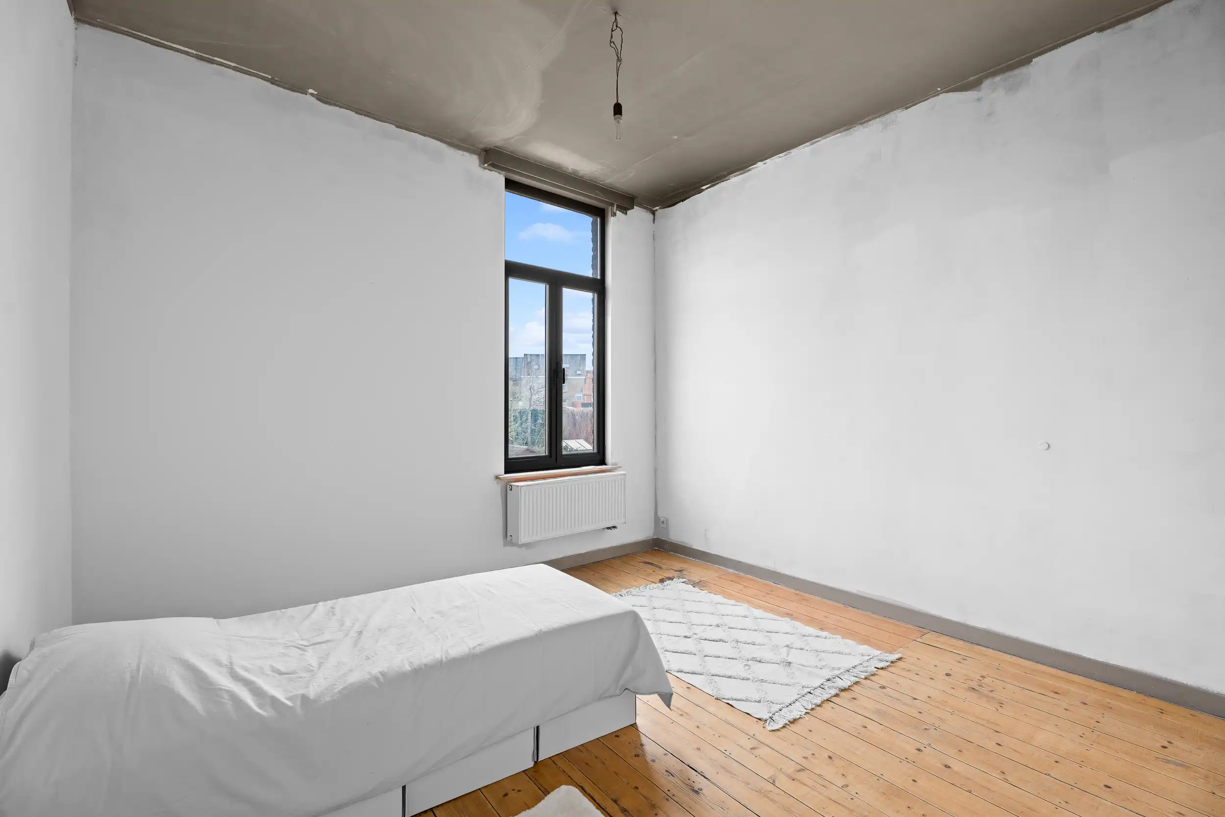 Ruime gezinswoning met zonnige tuin in Sint-Amandsberg foto 11