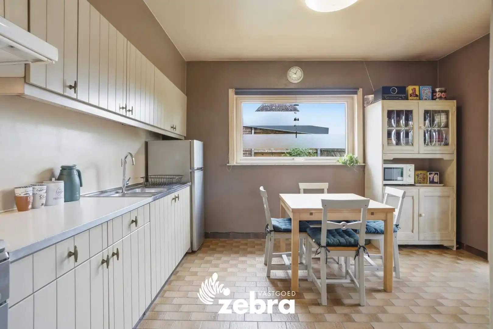 Gelijkvloerse open bebouwing met 3 slaapkamers in rustige omgeving! foto 8