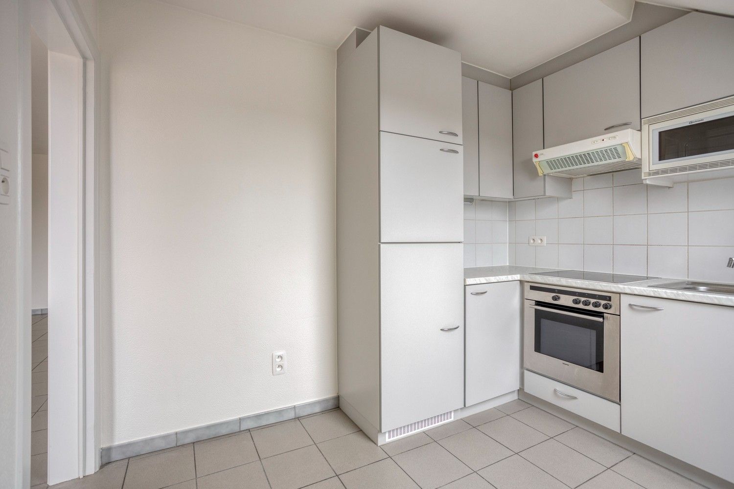 Ruime duplex met 3 slaapkamers  en garage te huur in het hart van Gellik, Lanaken foto 11