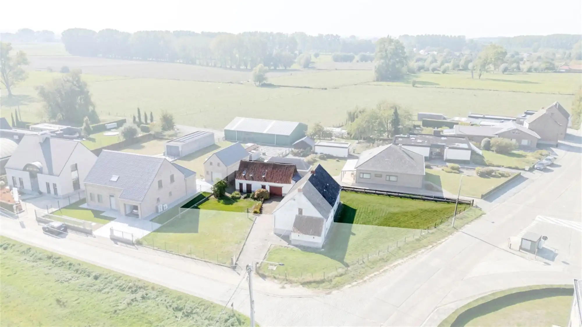 Mooi zuidelijk georiënteerd BOUWPERCEEL (ca. 618m²) voor OPEN BEBOUWING, landelijk gelegen én uitstekend bereikbaar foto 3