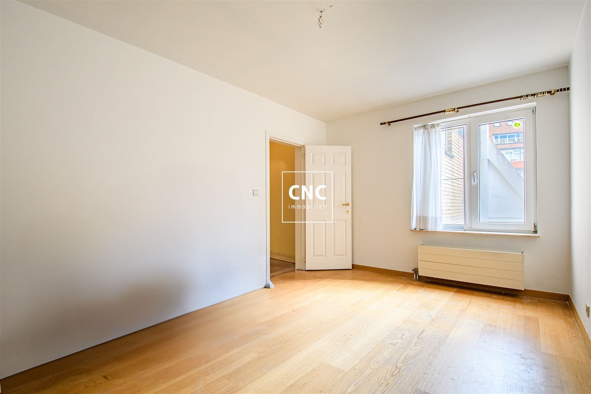 Instapklaar appartement met open zicht-Maurice Lippensplein
 foto 10