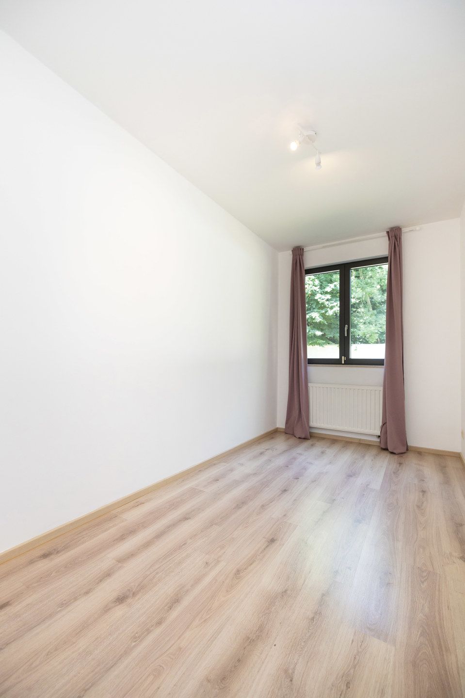 Appartement 3 slaapkamers ± 130 m² + tuin ± 200 m² + parkeerplaats foto 15