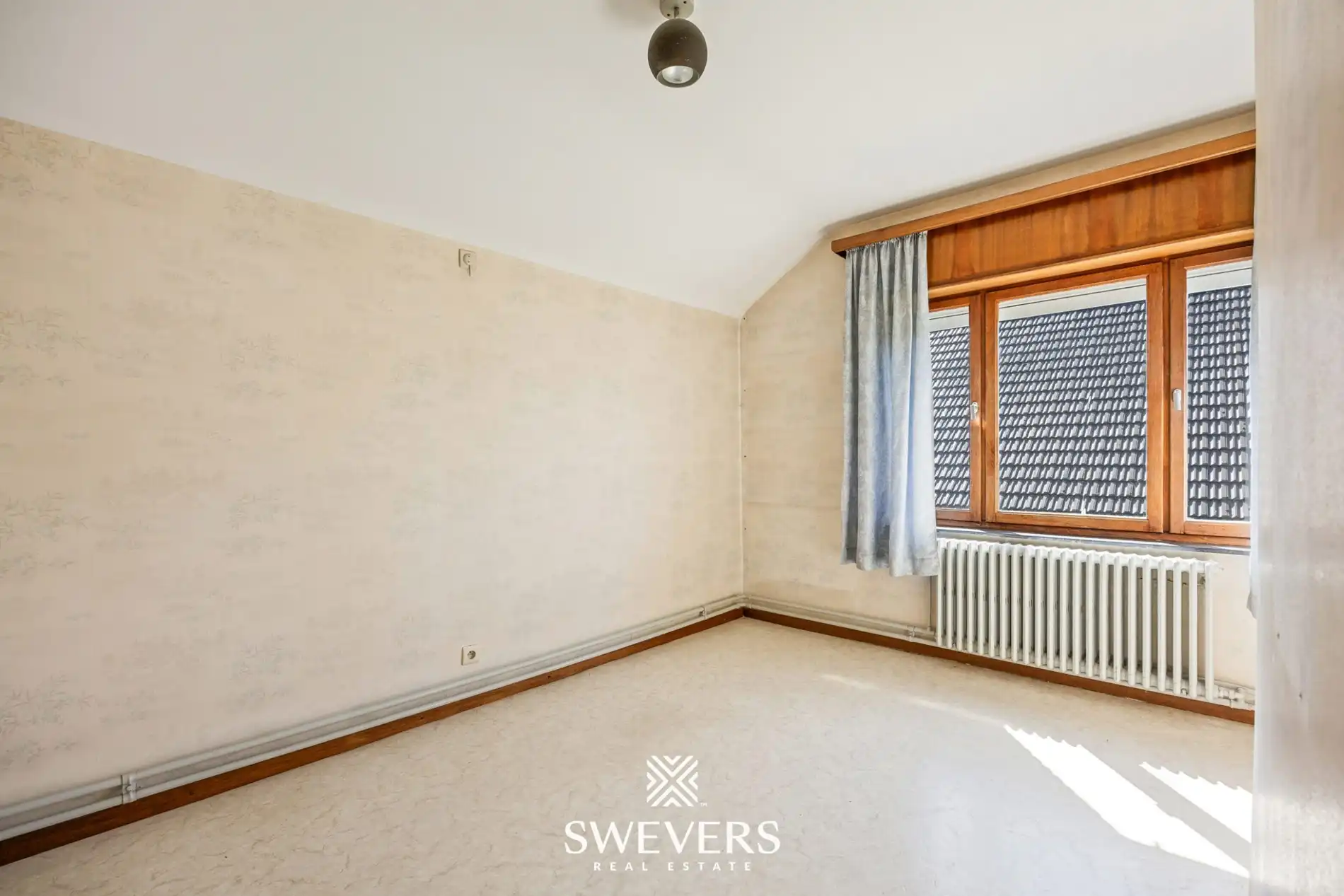 Op te frissen gezinswoning met 4 slaapkamers en veel potentieel foto 22